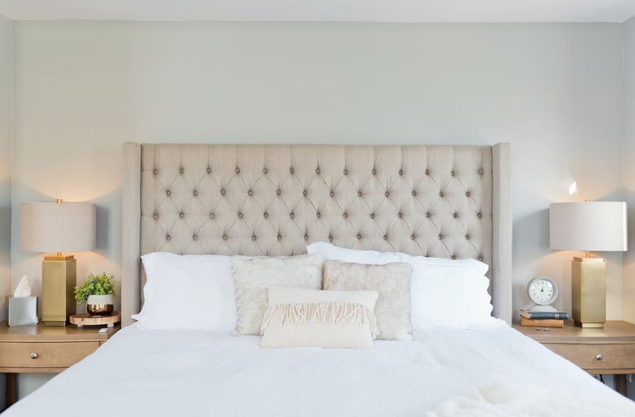 White bedding with cushions