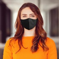 Woman wearing Martex Health plain black reusable face mask with antimicrobial protection.