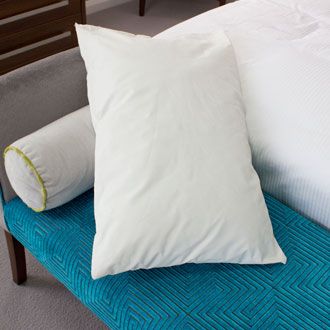 Waterproof pillows with flame retardant protection