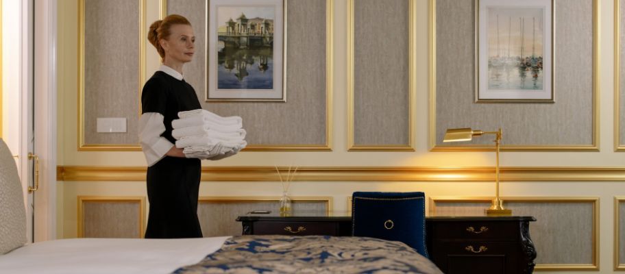 Housekeeper In Hotel Room